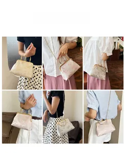 Dettagli della borsa a conchiglia jacquard vintage con manico e catena in metallo