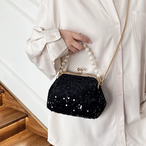 Black sequin vintage clasp handbag with pearl handle and gold chain strap for evening wear