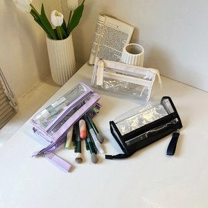 Set di tre pochette trasparenti in PVC con cinturino da polso portatile in viola e nero