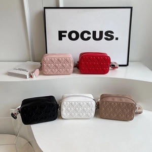 Chic heart-quilted crossbody bags in five colors with stylish patterned shoulder straps
