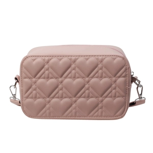 Pink leather crossbody camera bag featuring elegant heart-shaped quilted stitching