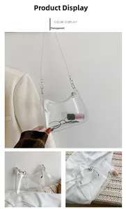 Detailed view of a transparent PVC hobo shoulder bag with silver metal buckles and contents
