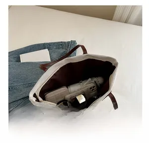 Top view of large canvas tote bag showing interior space with daily essentials