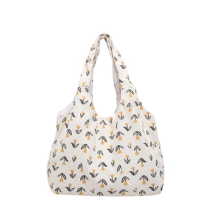 Borsa tote in velluto a coste beige con stampa di tulipani gialli e tracolla minimalista