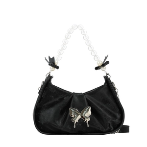 Sac à bandoulière plissé noir avec papillon métallique et anse en perles acryliques