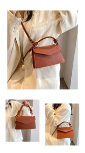 Detail of caramel lychee grain leather crossbody bag with elegant knotted handle and gold hardware