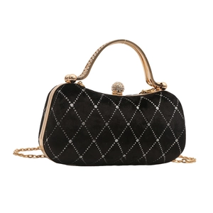Elegant black velvet clutch with silver diamond grid pattern and gold metal handle