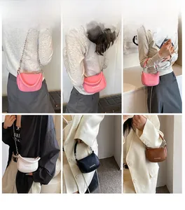 Détail du mini sac selle avec rivets en étoile et bandoulière en chaîne élégante