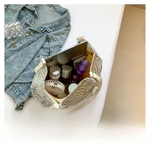 Top view of spacious tote bag showing interior storage for tablet and summer essentials