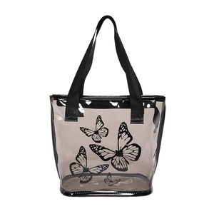 Minimalist smoky grey PVC tote bag with black butterfly prints and sturdy nylon handles