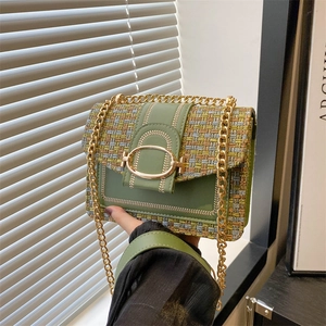 Green woven tweed flap shoulder bag with gold chain strap and metal buckle closure