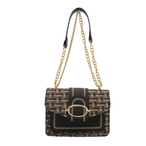 Chic tweed plaid crossbody bag with gold chain strap and vintage metal buckle on white background