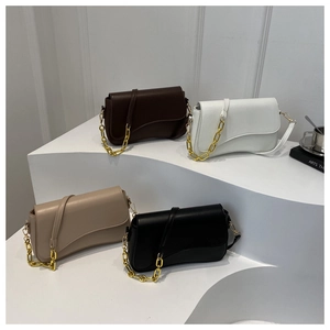 French vintage style handbags with asymmetric flaps and gold chains in four elegant colors
