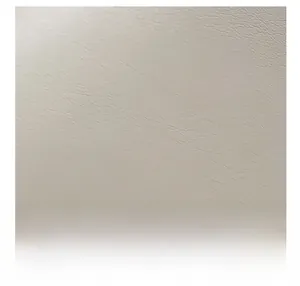 Macro shot of high-quality beige faux leather texture with soft natural grain details