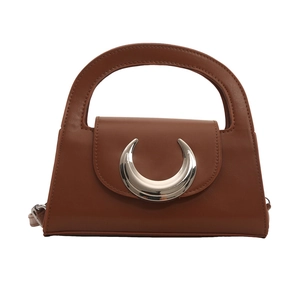 Brown leather trapezoid handbag with silver crescent moon buckle and curved top handle