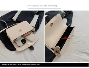 Vue détaillée de l'intérieur du sac crème montrant le rangement pour téléphone