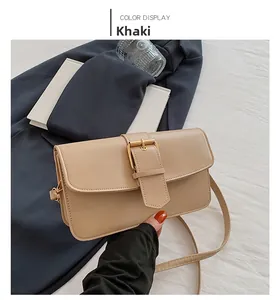 Detail view of khaki rectangular crossbody bag with elegant gold metal buckle and PU leather