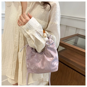 Detail of lavender marble pattern drawstring bag with acrylic beaded chain strap