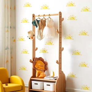 Detail of wooden kids coat rack with built-in height measurement scale 50-150cm