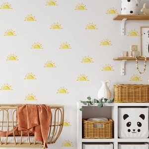 Minimalist yellow watercolor sun wall decals for children's room in a cozy nursery
