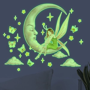 Luminous moon, fairy, and star wall stickers with green glow for dark room decor