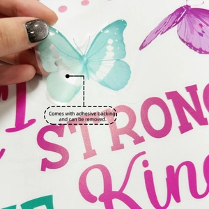 Close-up of removable butterfly wall sticker with strong and kind inspirational quotes