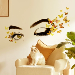 Artistic wall stickers with eyes and colorful butterflies for modern living room decor
