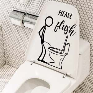 Close-up of funny toilet sticker with cartoon man and Please Flush text on lid