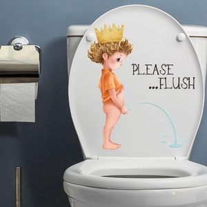 Detail of toilet seat sticker featuring a funny cartoon boy and Please Flush text