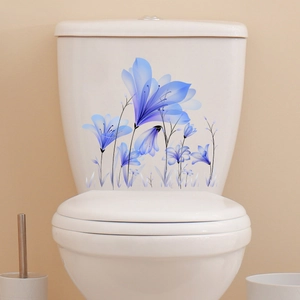 Blue watercolor floral wall stickers applied on white toilet tank for home bathroom decor