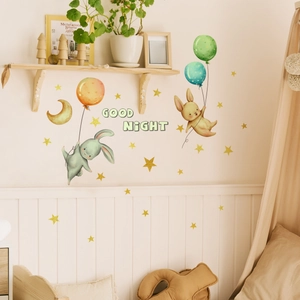 Detail of watercolor rabbit and stars wall decals with Good Night text for kids' rooms