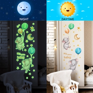 Luminous elephant and moon wall stickers showing daytime and night glow effects