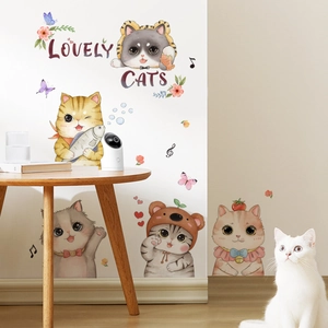 Detailed view of self-adhesive cartoon cat wall stickers and Lovely Cats text in a room