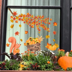 Fall themed static window clings featuring maple leaves, pumpkin, and squirrel decorations