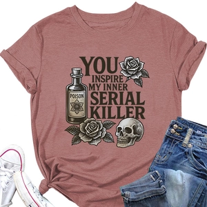 Detail of mauve crew neck tee with graphic print and stylish knot hem design