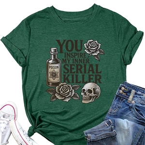 Detail of dark green t-shirt featuring gothic skull, roses and poison bottle graphics