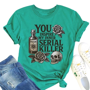 Detail of lime green cotton t-shirt featuring retro skull and poison bottle graphic print