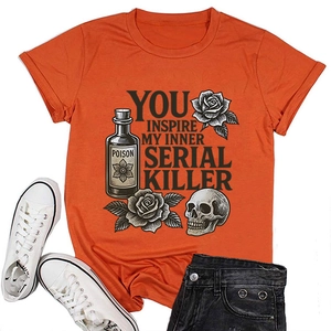 Detail of orange cotton T-shirt featuring vintage poison bottle and skull graphic art