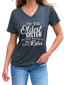 Detail of dark heather grey V-neck T-shirt with I'M THE Oldest SISTER printed slogan