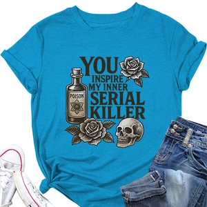 Sky blue vintage graphic tee with rose and skull design paired with white sneakers