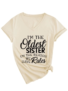 Detail of V-neck beige t-shirt with I'M THE Oldest SISTER printed slogan and stylish knot