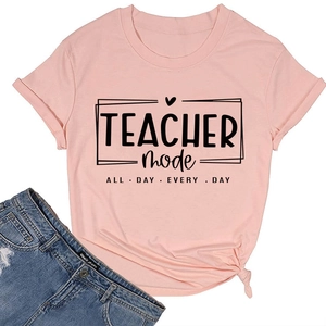 Flat lay of pink cotton T-shirt featuring TEACHER mode ALL DAY EVERY DAY text print