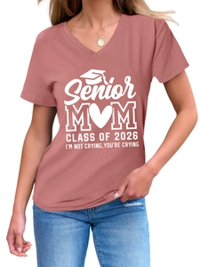 Detail of V-neck rose pink T-shirt featuring Senior MOM CLASS OF 2026 graduation print
