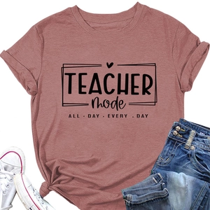 Close-up of Teacher Mode All Day Every Day slogan on dusty rose cotton t-shirt