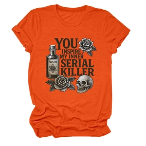 Close-up of orange cotton t-shirt featuring gothic skull, roses, and poison bottle print