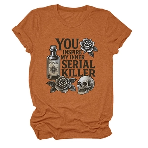 Detail of orange gothic T-shirt featuring skull, roses, and poison bottle graphics