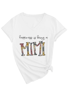 Close-up of white V-neck T-shirt featuring floral Mimi letter print and knotted hem detail