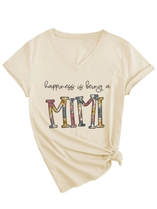 Detail of V-neck beige t-shirt with retro floral Mimi print and side knot hem
