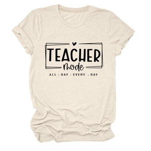 Close-up of Teacher Mode print on a creamy round neck short sleeve cotton T-shirt