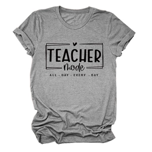 Detail of grey Teacher Mode cotton t-shirt featuring bold typography and heart graphic